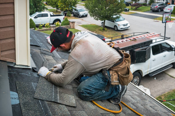 Professional Roofing technician working in Lunenburg, MA